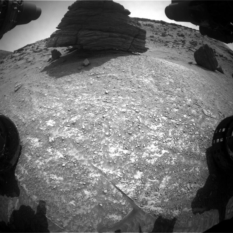 This Front Hazard Camera from Sol 3533 shows the boulder “Ilha Nova Destino.”