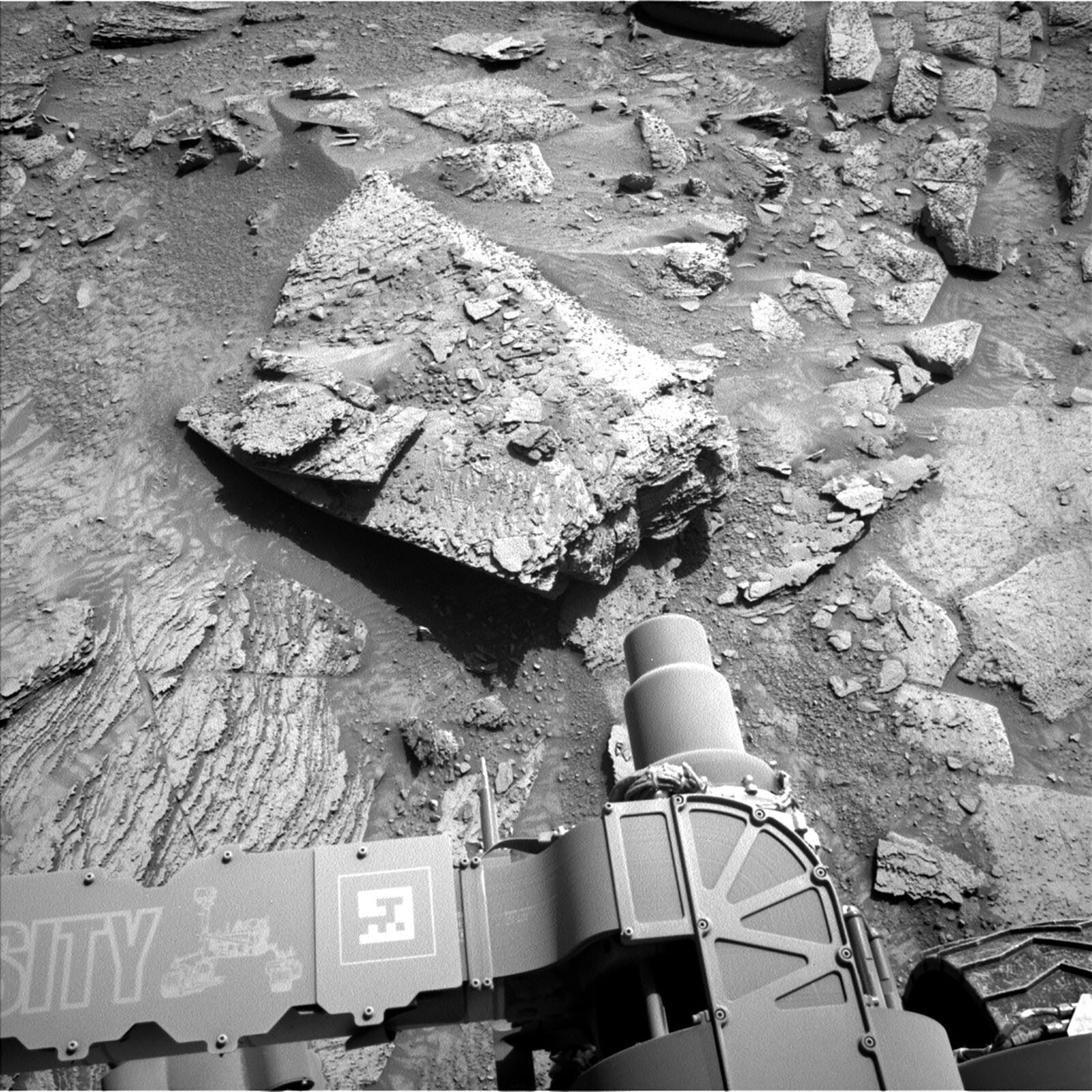 This image features part of Curiosity's body on the rocky terrain. It was taken by Left Navigation Camera onboard NASA's Mars rover Curiosity on Sol 3897.