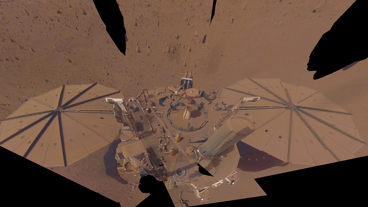 NASA’s InSight lander captured this selfie on April 24, 2022. Dust on its solar panels caused the lander to lose power in December of that year, but data recorded by InSight’s instruments is still leading to new science. 