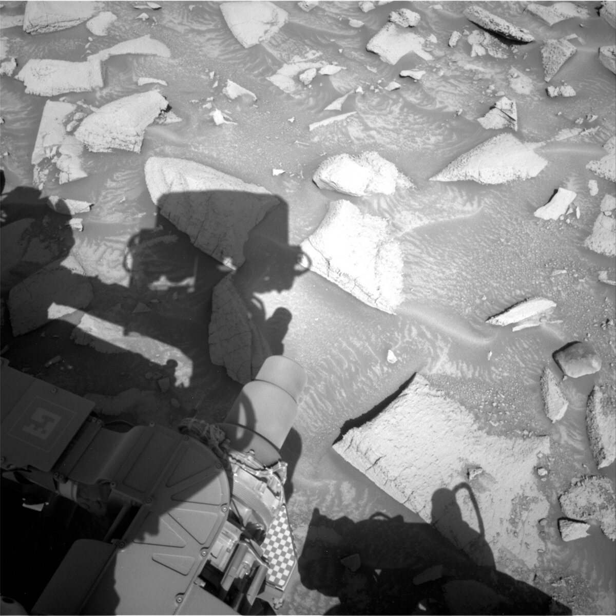 This image of part of the Curiosity rover over the Mars surface was taken by Right Navigation Camera onboard NASA's Mars rover Curiosity on Sol 3908.