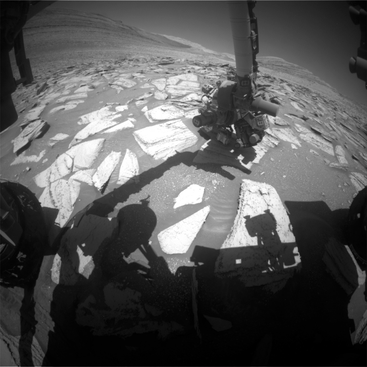 This image was taken by Front Hazard Avoidance Camera (Front Hazcam) onboard NASA's Mars rover Curiosity on Sol 3978. Credits: NASA/JPL-Caltech. Download image ›