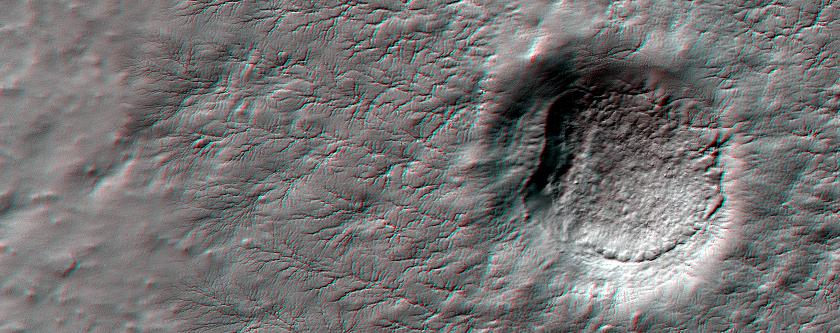 This anaglyph from HiRISE shows erosional features formed by seasonal frost near the south pole of Mars.