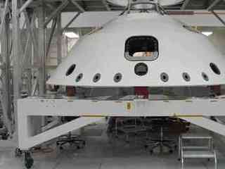 This image shows the heatshield inside a large 'clean room'