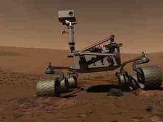 This artists concept of MSL is a still from the MSL Mission Overview video. It shows MSL on the surface of Mars.