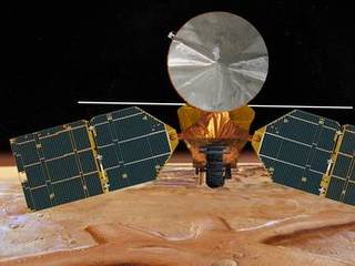 This artist's concept of the Mars Reconnaissance Orbiter features the spacecraft's main bus facing down, toward the red planet.