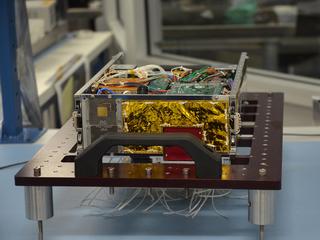 One of the two MarCO (Mars Cube One) CubeSat spacecraft, with its insides displayed, is seen at NASA's Jet Propulsion Laboratory, Pasadena, California.