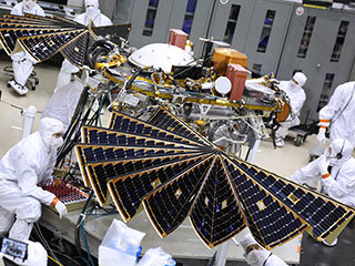 While in the landed configuration for the last time before arriving on Mars, NASA's InSight lander was commanded to deploy its solar arrays to test and verify the exact process that it will use on the surface of the Red Planet. 