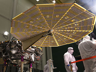 While in the landed configuration for the last time before arriving on Mars, NASA's InSight lander was commanded to deploy its solar arrays to test and verify the exact process that it will use on the surface of the Red Planet.