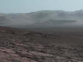 Curiosity Project Scientist Ashwin Vasavada gives a descriptive tour of the Mars rover's view in Gale Crater.  The scene from "Vera Rubin Ridge" looks back over the journey so far, including buttes, dunes and other features along the route.