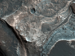 Layers along a Pit in Coprates Catena
