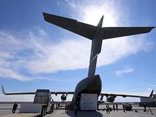 Personnel supporting NASA's InSight mission to Mars load the crated InSight spacecraft into a C-17 cargo aircraft at Buckley Air Force Base, Denver, for shipment to Vandenberg Air Force Base, California. The spacecraft, built in Colorado by Lockheed Martin Space, was shipped February 28, 2018, in preparation for launch from Vandenberg in May 2018.