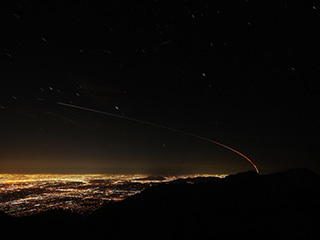 This image shows the trail of NASA’s Mars InSight lander over the Los Angeles area after launching from Vandenberg Air Force Base in Central California on May 5, 2018. This is a stack of exposures taken from Mt. Wilson. 
