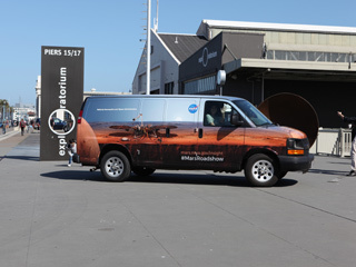 This is an image of the Mars InSight Roadshow van at San Francisco's Exploratorium in April 2018.