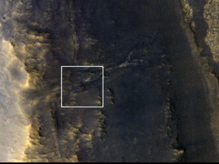 NASA's Opportunity rover appears as a blip in this image, which was taken by HiRISE, a high-resolution camera on NASA's Mars Reconnaissance Orbiter.