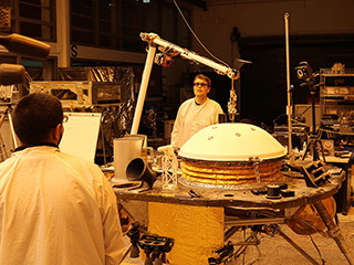 NASA’s InSight mission tests an engineering version of the spacecraft’s robotic arm in a Mars-like environment at NASA’s Jet Propulsion Laboratory.
