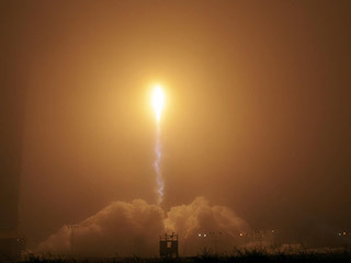 This is an illustration showing a simulated view of NASA's InSight lander about to land on the surface of Mars.