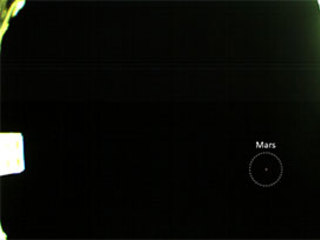 One of the twin MarCO CubeSats snapped this image of Mars on Oct. 3 – the first image of the Red Planet ever produced by this class of tiny, low-cost spacecraft. 