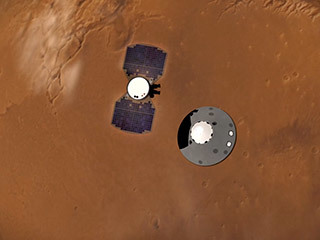 This illustration shows NASA’s InSight lander separating from its cruise stage as it prepares to enter Mars’ atmosphere. The InSight lander is on the right, tucked inside a protective heat shield and back shell. The cruise stage with solar panels is on the left.