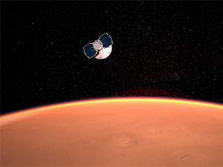 The InSight spacecraft approaches Mars in this artist’s concept.