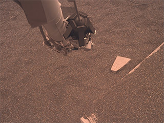 This test image from an engineering model of NASA’s InSight lander shows part of the lander’s robotic arm and the simulated Martian ground at a testbed at NASA’s Jet Propulsion Laboratory in Pasadena, California.