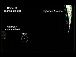 NASA's twin MarCO spacecraft are scheduled to make a flyby of Mars on Nov. 26. On Nov. 24, a wide-angle camera on MarCO-B took this picture of the Red Planet, which appears as small, grey dot in the lower left quadrant of the image. 