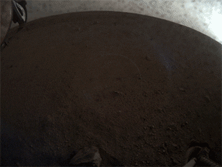 A fish-eye view of NASA's InSight lander deploying its first instrument onto the surface of Mars, taken by the spacecraft's Instrument Context Camera (ICC) on Dec. 19, 2018.