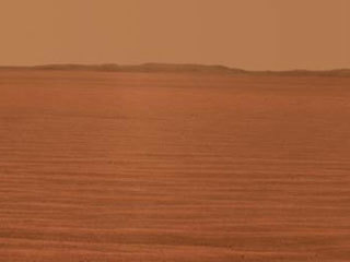 NASA's Mars Exploration Rover Opportunity used its panoramic camera to record this eastward horizon view on the 2,407th Martian day, or sol, of the rover's work on Mars (Oct. 31, 2010).