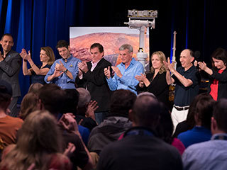 A round of applause at NASA's Jet Propulsion Laboratory in Pasadena, California, for a successful end to the mission of NASA's Opportunity Mars rover on Feb. 13, 2019.