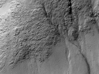 This image acquired on December 26, 2018 by NASAs Mars Reconnaissance Orbiter, shows the hills that resulted from uplifted rocks due to an impact that formed the 230-kilometer diameter Galle Crater.