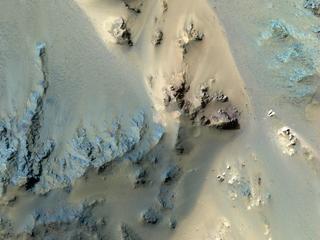 This image acquired on January 27, 2019 by NASAs Mars Reconnaissance Orbiter, shows the extensive central peak complex of Hale Crater.