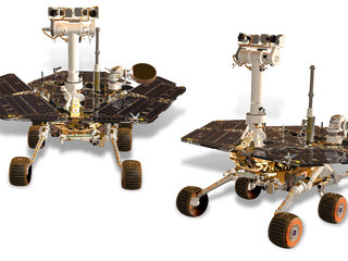 This artist's rendering depicts NASA's Mars Exploration Rovers, Spirit and Opportunity. The twin rovers were launched in 2003 and arrived on Mars in January 2004.
