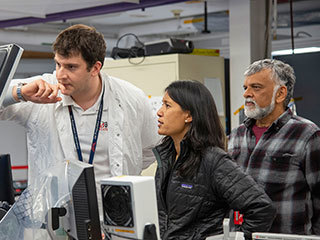 Teddy Tzanetos, MiMi Aung and Bob Balaram of NASA’s Mars Helicopter project observe a flight test.