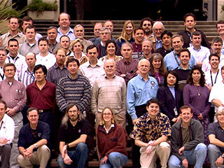 Scientists and engineers working on NASA’s Mars Exploration Rover mission gather for a team portrait during the rovers’ prime mission on Mars in 2004 at NASA’s Jet Propulsion Laboratory in Pasadena, California.