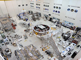 This image shows major components of NASA's Mars 2020 mission in the High Bay 1 clean room in JPL's Spacecraft Assembly Facility.