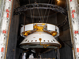 Engineers prepare the Mars 2020 spacecraft for a thermal vacuum (TVAC) test in the Space Simulator Facility at NASA's Jet Propulsion Laboratory in Pasadena, California. 