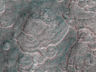 This terrain is covered by pits and scallops (pits open on one side)