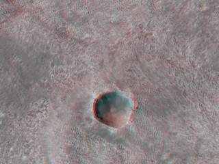 This DLE [double layer ejecta] crater formed at the edge of an older/pre-existing crater