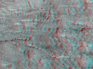 This image covers part of the floor of a large ancient impact crater, near the western rim.
