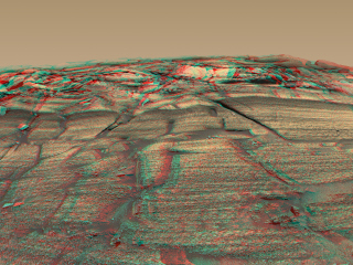 The panoramic camera on NASA's Mars Exploration Rover Opportunity captured a sweeping image of "Burns Cliff".