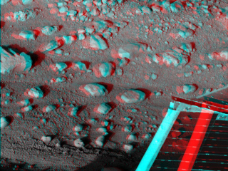 This anaglyph, acquired by NASA's Phoenix Lander's Surface Stereo Imager on Sol 33 shows a stereoscopic 3D view of the Martian surface near the lander