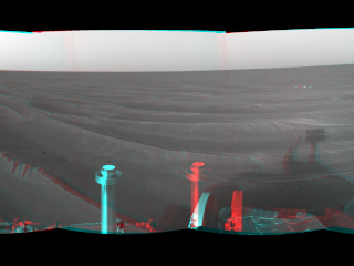 NASA's Mars Exploration Rover Opportunity set a one-day distance record for martian driving on the rover's 383rd martian day, or sol, which began on Feb. 19, 2005