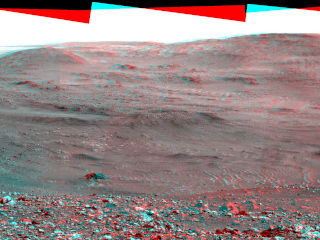NASA's Mars Exploration Rover Spirit obtained this stereo panorama of the surrounding Martian terrain in Gusev Crater from two positions about 10 meters (33 feet) apart