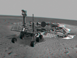 This 3-D image combines computer-generated models of the Mars Exploration Rover Spirit and its lander with real surface data from the rover's panoramic camera