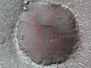 On its 256th orbit of Mars, the camera on-board the Mars Global Surveyor spacecraft successfully observed the vicinity of the Pathfinder landing site. The images shown are a stereoscopic image pair in anaglyph format, made from the overlapping area of MOC 25603 and 23703