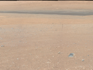 This image is the first high-resolution color mosaic from NASA's Curiosity rover, showing the geological environment around the rover's landing site in Gale Crater on Mars.