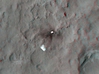 This 3D, or stereo anaglyph, view shows the parachute and back shell that helped guide NASA's Curiosity to the surface of Mars.