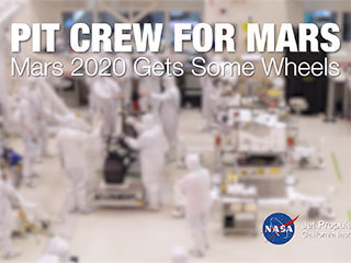 A team of engineers at NASA's Jet Propulsion Laboratory in Pasadena, California, install the legs and wheels — otherwise known as the mobility suspension — on the Mars 2020 rover. The imagery for this accelerated time-lapse was taken on June 13, 2019, from a camera above the Spacecraft Assembly Facility's High Bay 1 clean room.