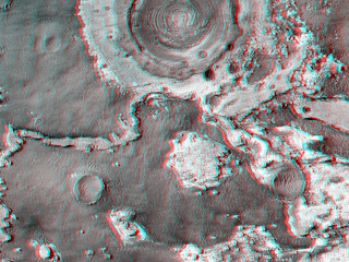 This image features an exhumed crater in Meridiani Planum, an equatorial region where the rover Opportunity has been exploring the Martian surface since January 2004.