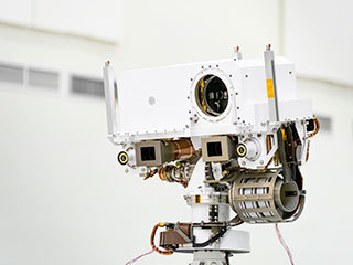 This image, taken in the Spacecraft Assembly Facility's High Bay 1 at the Jet Propulsion Laboratory in Pasadena, California, on July 23, 2019, shows a close-up of the head of Mars 2020's remote sensing mast.
