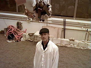 The engineering model of NASA's InSight lander took an image of the actor Brad Pitt at JPL on Sept. 6, 2019, using the instrument deployment camera on the replica's robotic arm. Pitt visited JPL to learn about real space technology after filming his space-themed movie "Ad Astra."